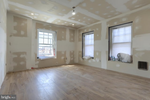 228 Cumberland St, Lebanon, PA 17042 - empty room with plenty of natural light and light wood-type flooring