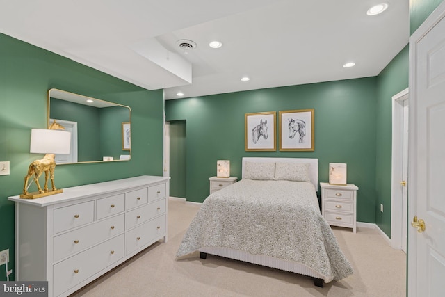 carpeted bedroom with recessed lighting, visible vents, and baseboards