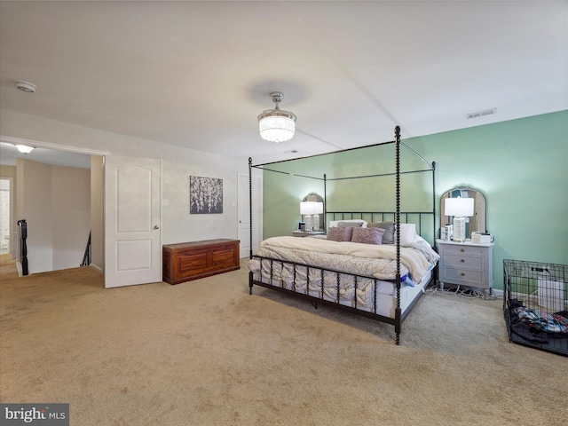 bedroom featuring visible vents and carpet floors