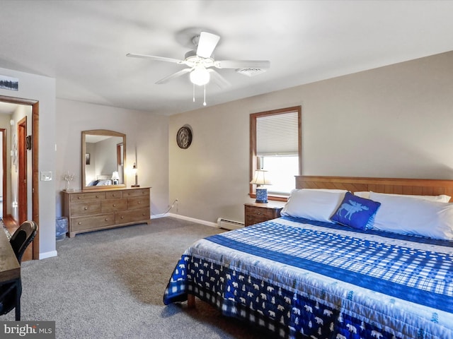 carpeted bedroom with a baseboard heating unit, baseboards, and ceiling fan