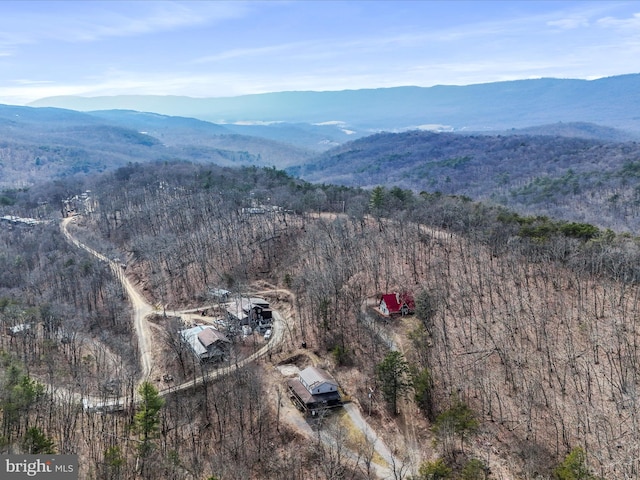 bird's eye view featuring a mountain view and a forest view