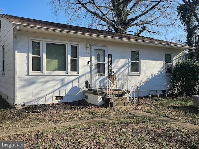 view of front facade with crawl space