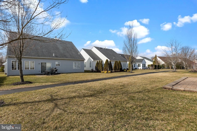 exterior space with a front lawn