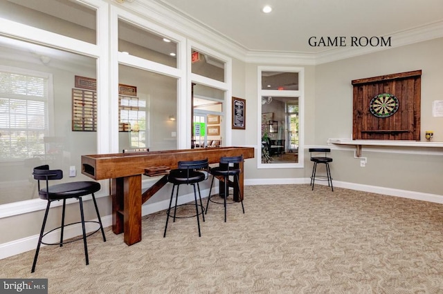 dining room with recessed lighting, baseboards, carpet, and crown molding