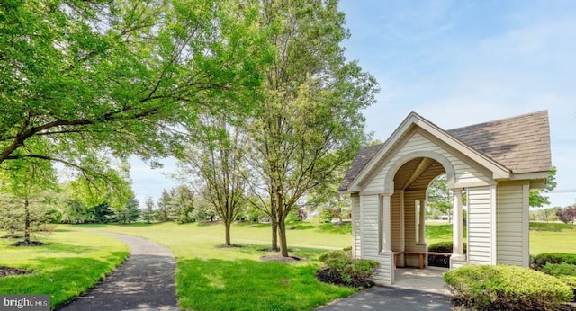 view of community featuring a lawn