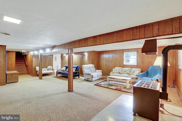 381 N Main St, Spring Grove, PA 17362 - living area with stairway, wood walls, and tile patterned floors