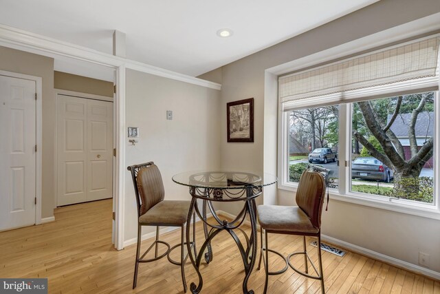 12521 N Lake Ct, Fairfax, VA 22033 - dining area with visible vents, light wood-style flooring, and baseboards