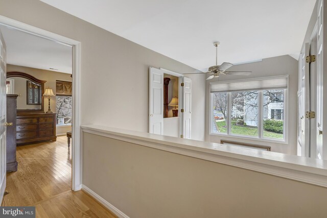 12521 N Lake Ct, Fairfax, VA 22033 - corridor featuring baseboards and light wood-style floors