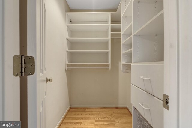 12521 N Lake Ct, Fairfax, VA 22033 - walk in closet featuring light wood-style flooring