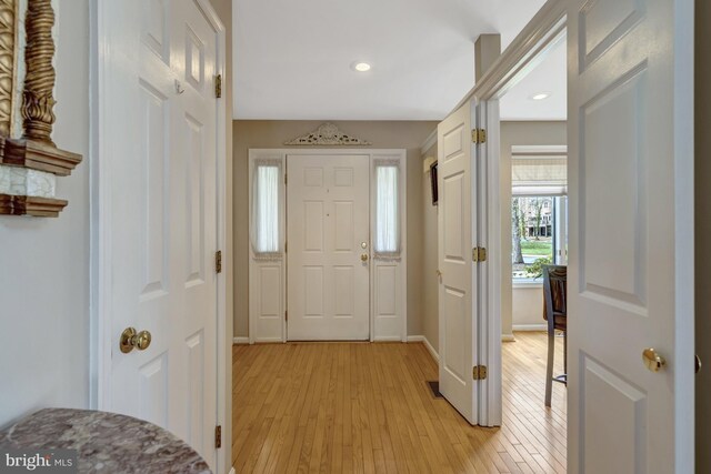 12521 N Lake Ct, Fairfax, VA 22033 - entryway with light wood-type flooring, baseboards, and recessed lighting