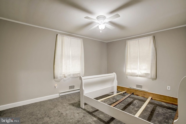 unfurnished bedroom with baseboards, visible vents, carpet floors, a baseboard radiator, and ornamental molding