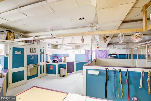 interior space featuring concrete flooring