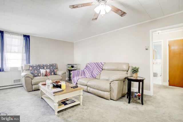 carpeted living area with crown molding, a ceiling fan, baseboards, and baseboard heating