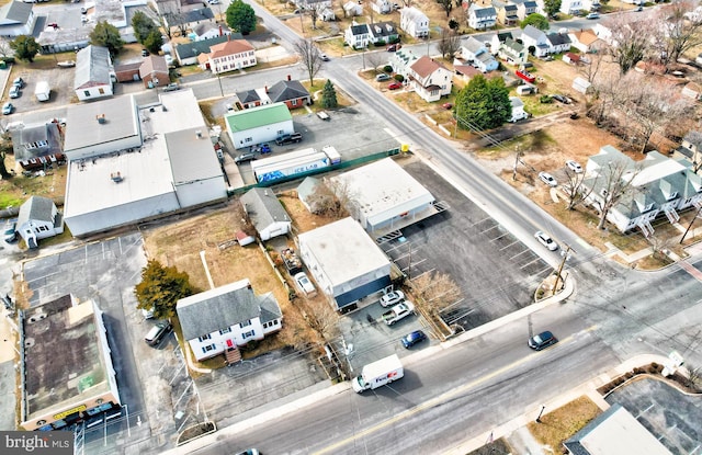 birds eye view of property with a residential view