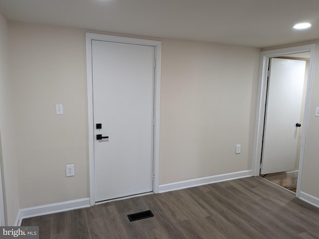 interior space with visible vents, recessed lighting, baseboards, and wood finished floors