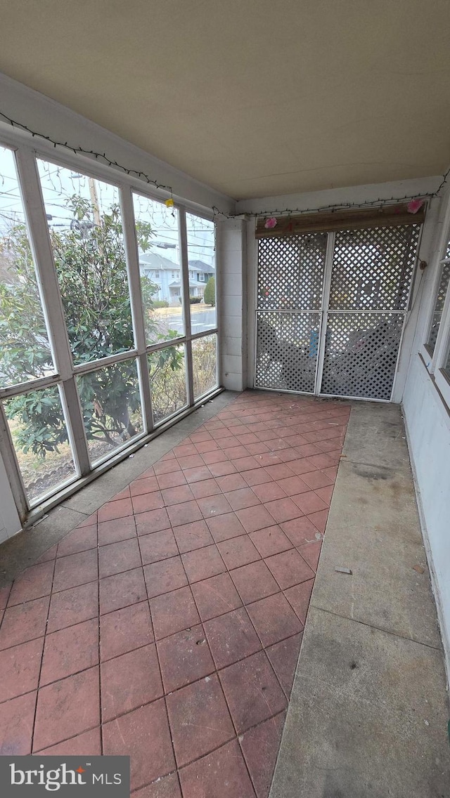 view of unfurnished sunroom