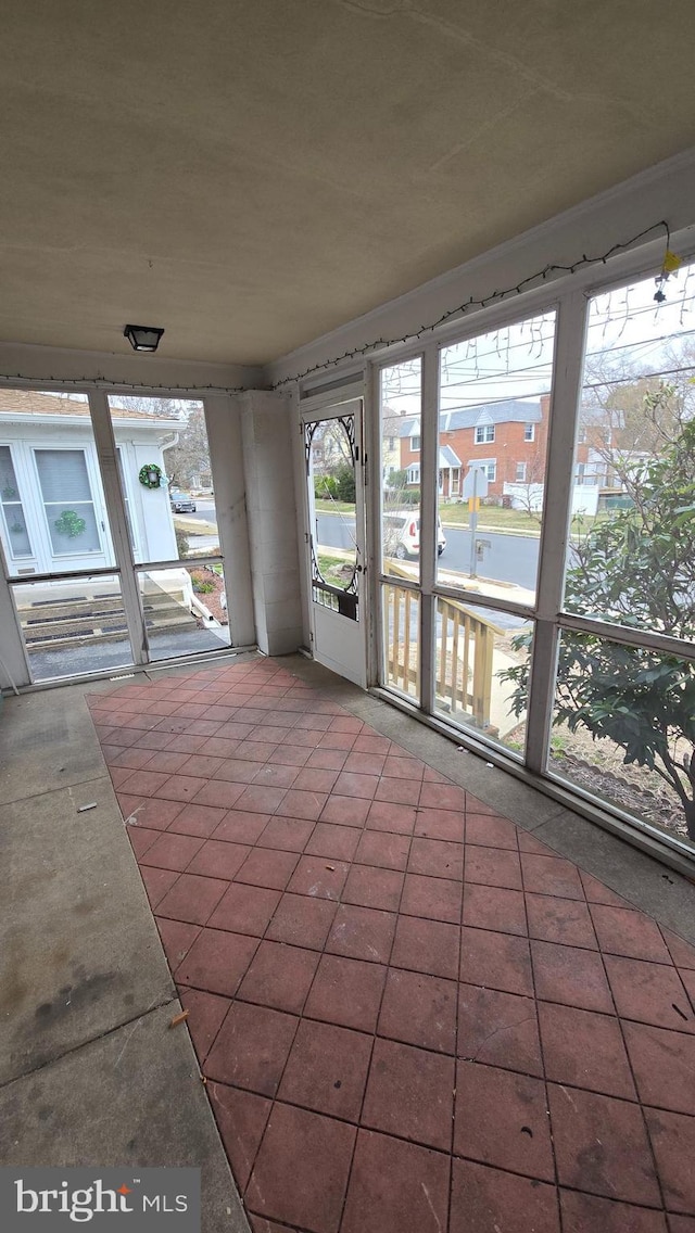 view of unfurnished sunroom