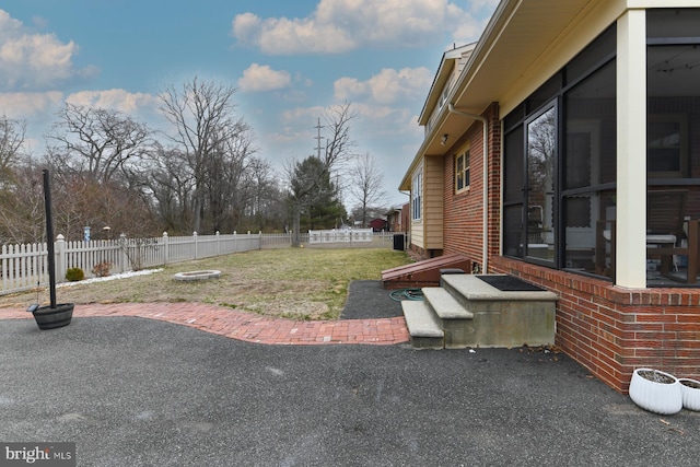 view of yard with a patio area and a fenced backyard