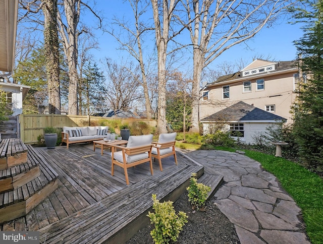 wooden deck featuring an outdoor hangout area