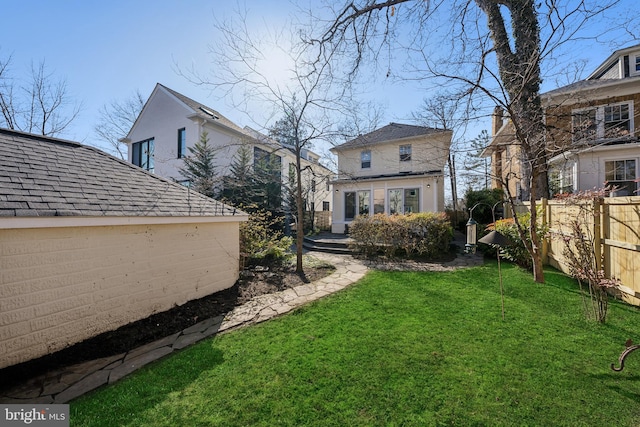 view of yard featuring fence