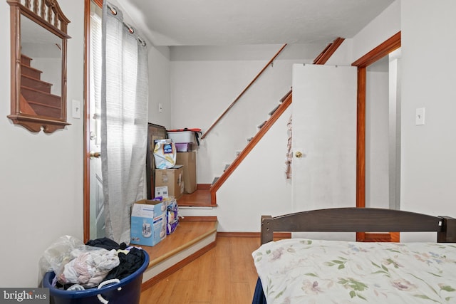 bedroom featuring wood finished floors