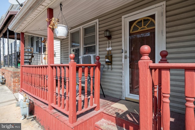 wooden deck featuring a porch