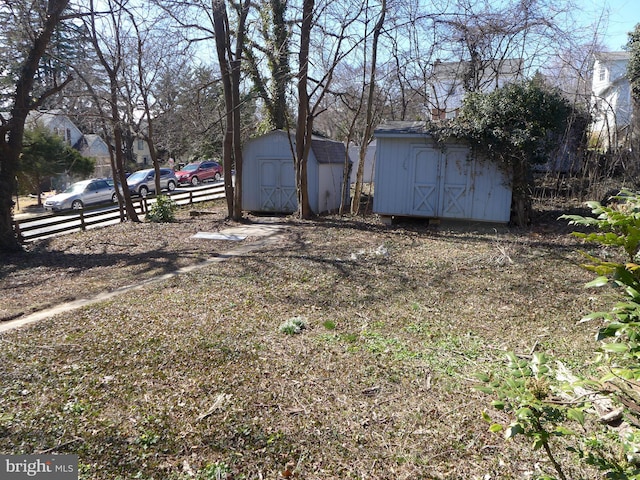 view of yard with a storage unit and an outdoor structure