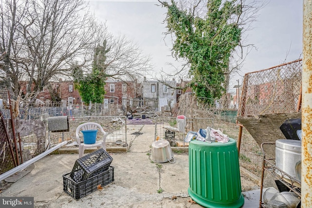 view of yard featuring a patio and fence