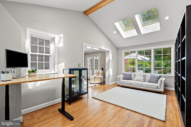 3517 Woodbine St, Chevy Chase, MD 20815 - living room featuring high vaulted ceiling, a skylight, baseboards, wood finished floors, and beamed ceiling