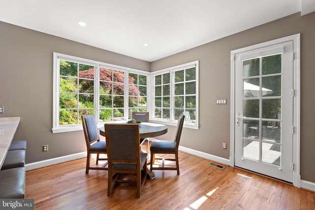 3517 Woodbine St, Chevy Chase, MD 20815 - dining room with baseboards, visible vents, and a healthy amount of sunlight