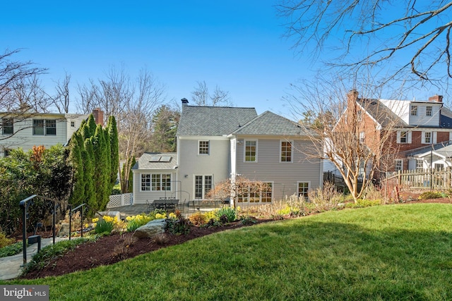 3517 Woodbine St, Chevy Chase, MD 20815 - rear view of property featuring a patio area, fence, and a yard