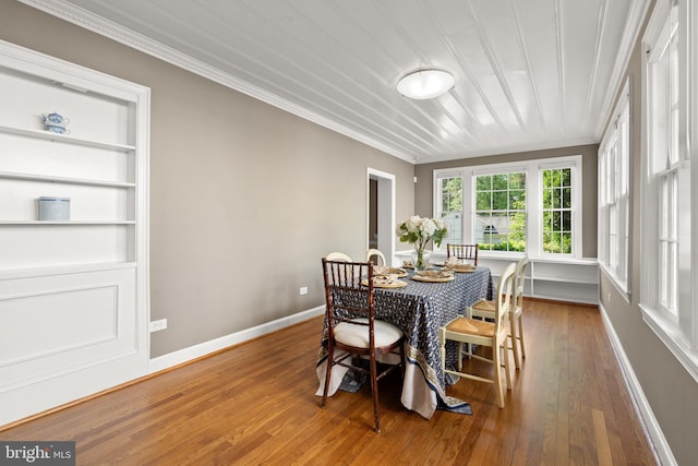 3517 Woodbine St, Chevy Chase, MD 20815 - dining room with baseboards, ornamental molding, and wood-type flooring