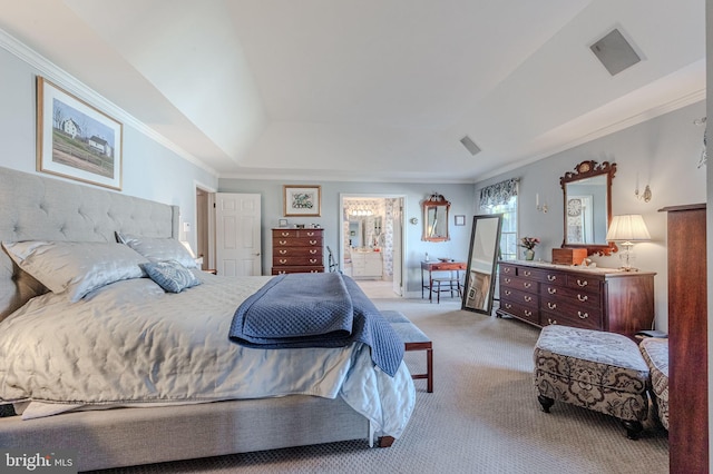 bedroom featuring ensuite bathroom, visible vents, carpet floors, and ornamental molding