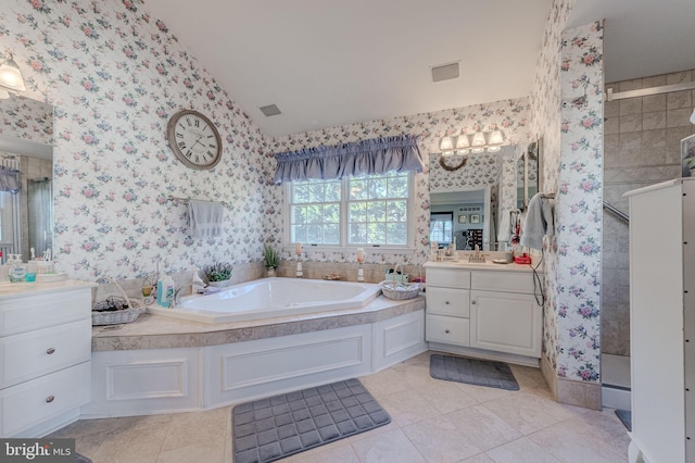 bathroom with visible vents, a garden tub, wallpapered walls, tiled shower, and vanity