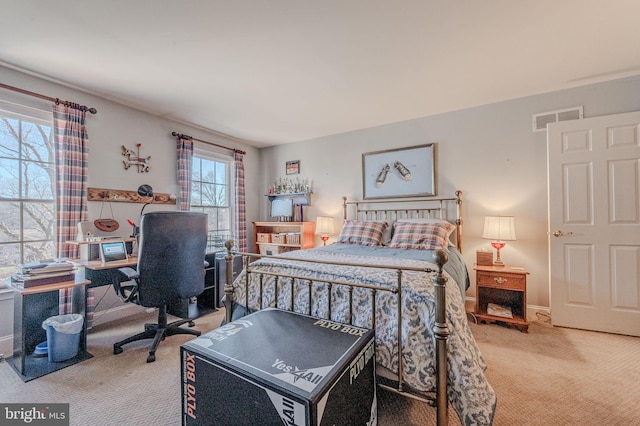 carpeted bedroom with visible vents