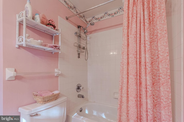 full bathroom with shower / bath combination with curtain and toilet