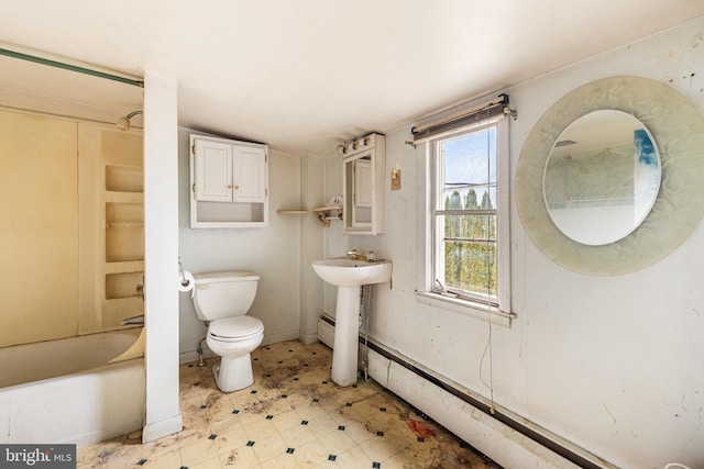 full bathroom with baseboards, a baseboard radiator, shower / washtub combination, tile patterned floors, and toilet