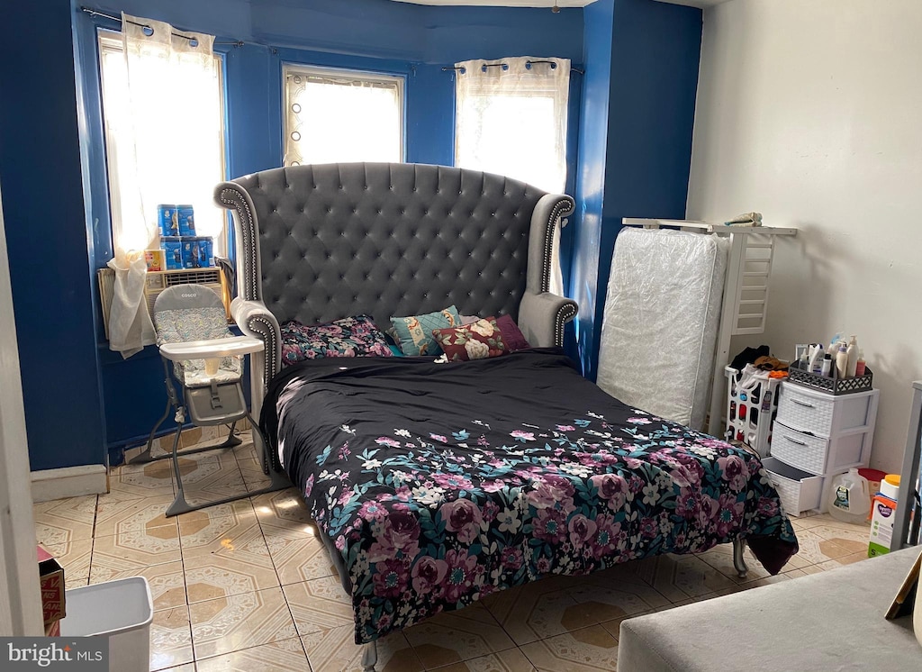 bedroom with tile patterned flooring