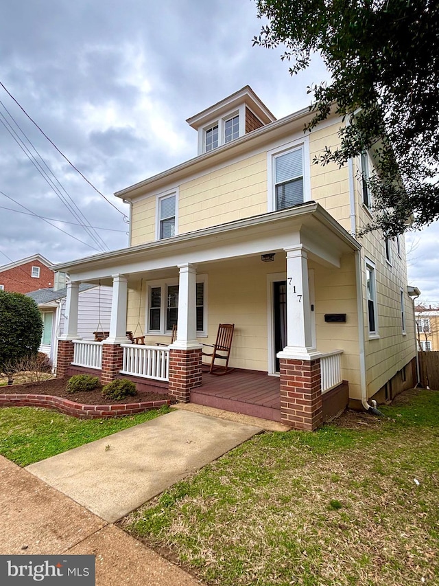 traditional style home featuring a porch