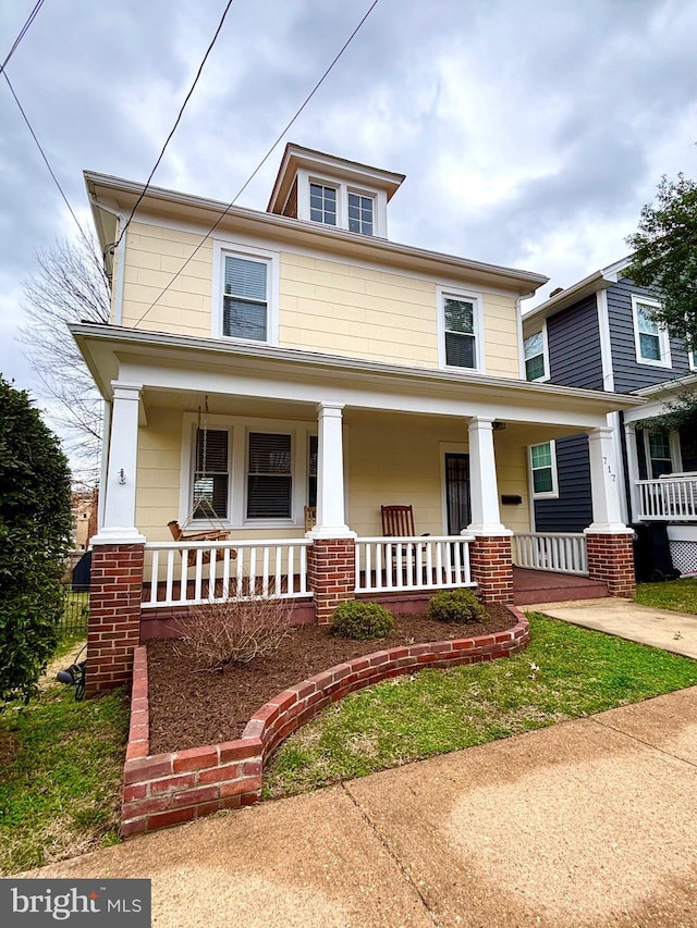 traditional style home with a porch