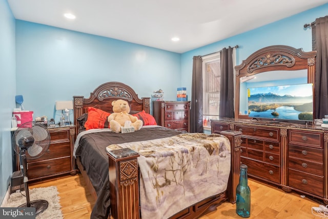 bedroom featuring recessed lighting and light wood-style floors