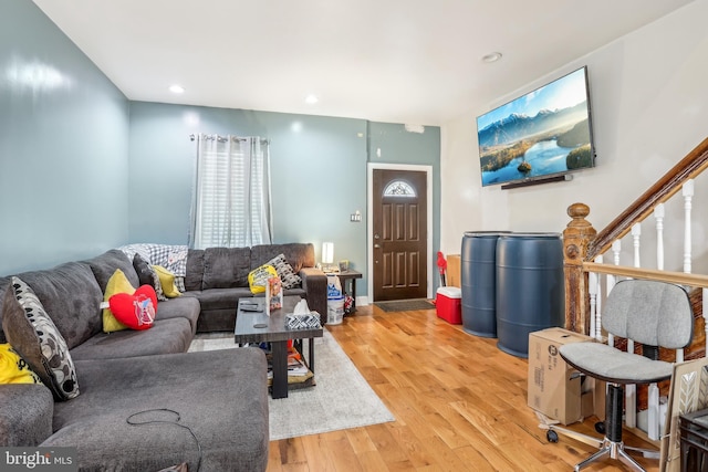 living room featuring recessed lighting and light wood-style floors