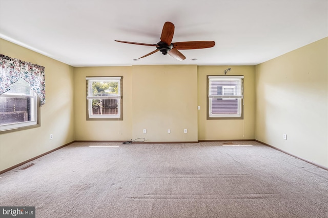 12703 Kembridge Dr, Bowie, MD 20715 - empty room with ceiling fan, healthy amount of natural light, carpet floors, and baseboards