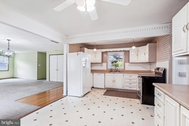 12703 Kembridge Dr, Bowie, MD 20715 - kitchen featuring white appliances, a sink, ceiling fan, and white cabinetry
