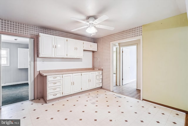 12703 Kembridge Dr, Bowie, MD 20715 - kitchen featuring baseboards, light floors, a ceiling fan, and white cabinets