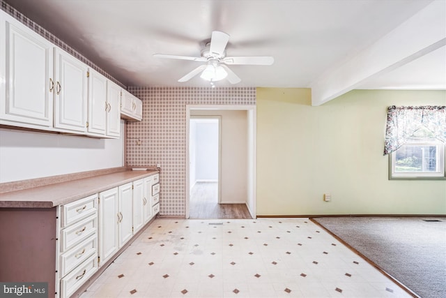 12703 Kembridge Dr, Bowie, MD 20715 - kitchen featuring ceiling fan, white cabinets, light floors, light countertops, and baseboards