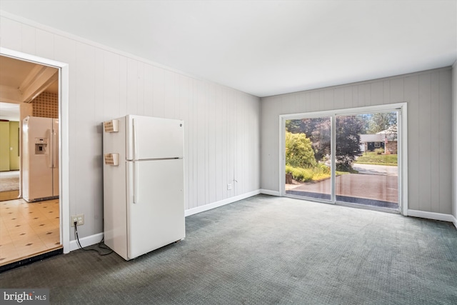 12703 Kembridge Dr, Bowie, MD 20715 - carpeted empty room with baseboards and wood walls