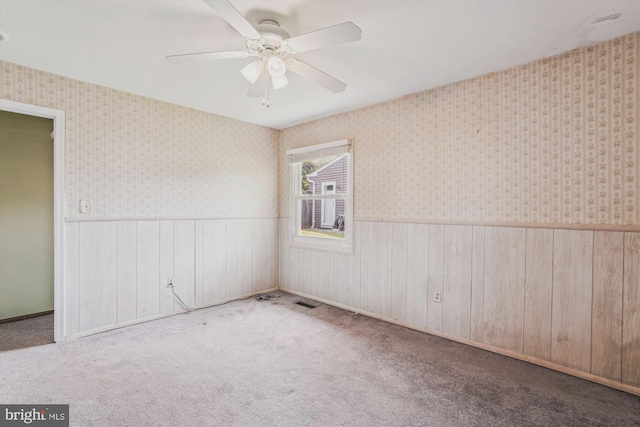12703 Kembridge Dr, Bowie, MD 20715 - carpeted spare room featuring wainscoting, a ceiling fan, and wallpapered walls