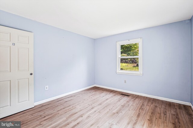 12703 Kembridge Dr, Bowie, MD 20715 - unfurnished room featuring wood finished floors and baseboards