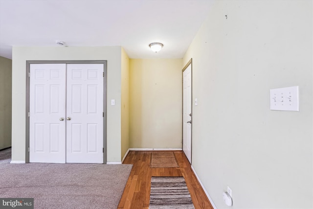 12703 Kembridge Dr, Bowie, MD 20715 - hallway featuring wood finished floors and baseboards